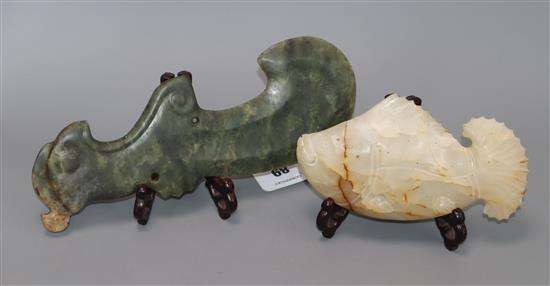 A Chinese archaistic white hardstone fish and a green hardstone dagger 17.5cm and 27cm